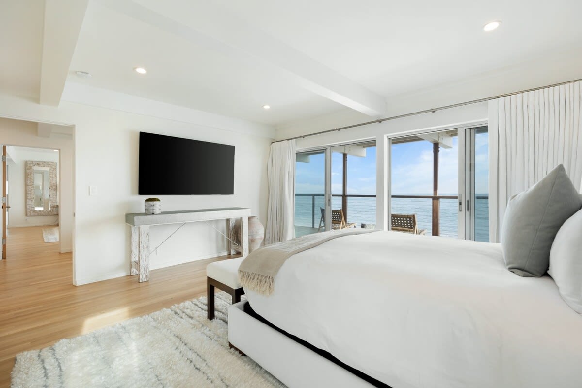 Tuck yourself into the luxurious bed for sweet slumber.