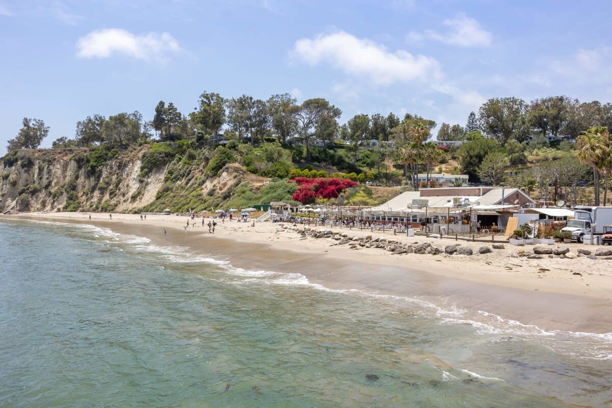 Swim, surf or bathe in the sun at Paradise Cove Beach tucked beneath the cliffs of Malibu.