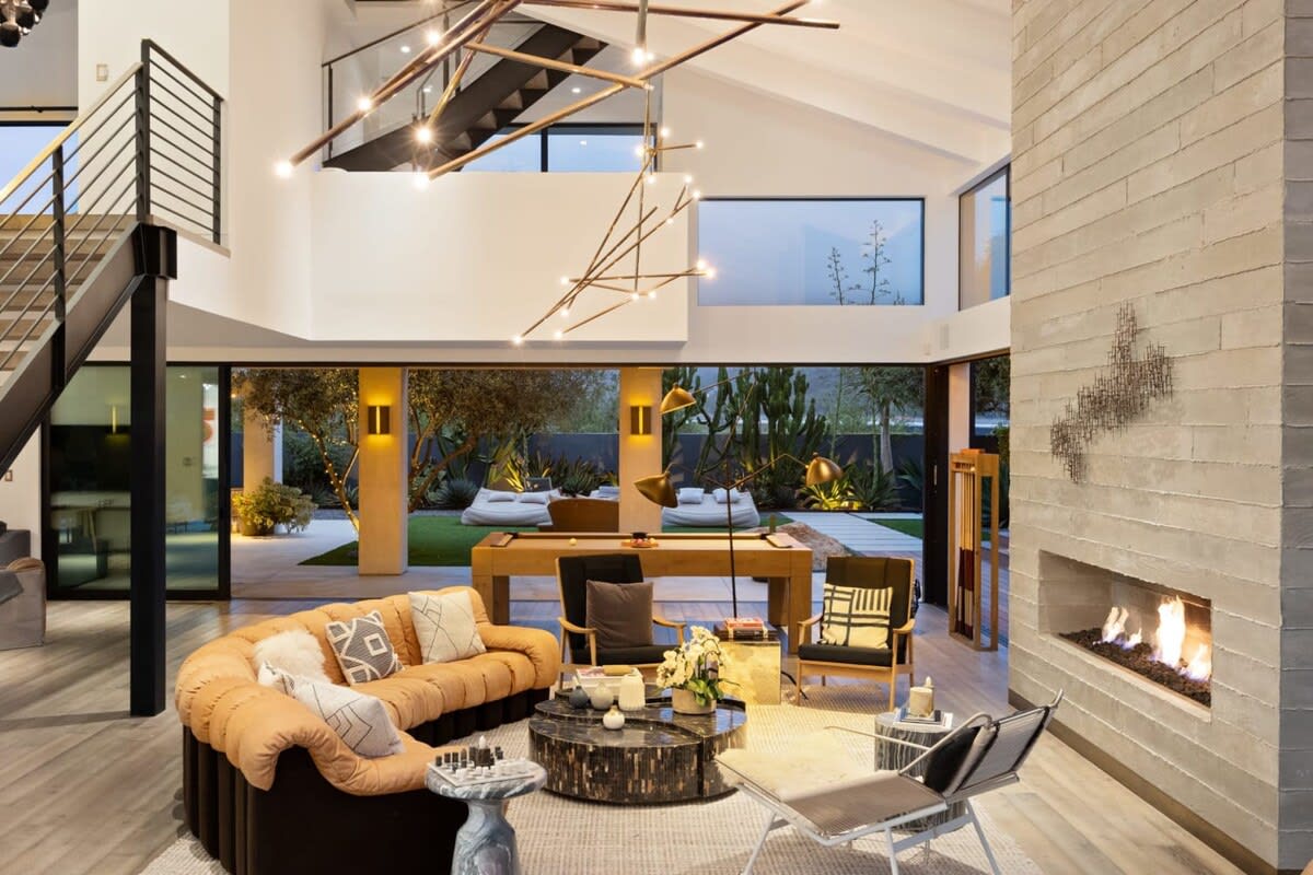 Snuggle up in front of the fireplace with a cup of hot chocolate to end the night.