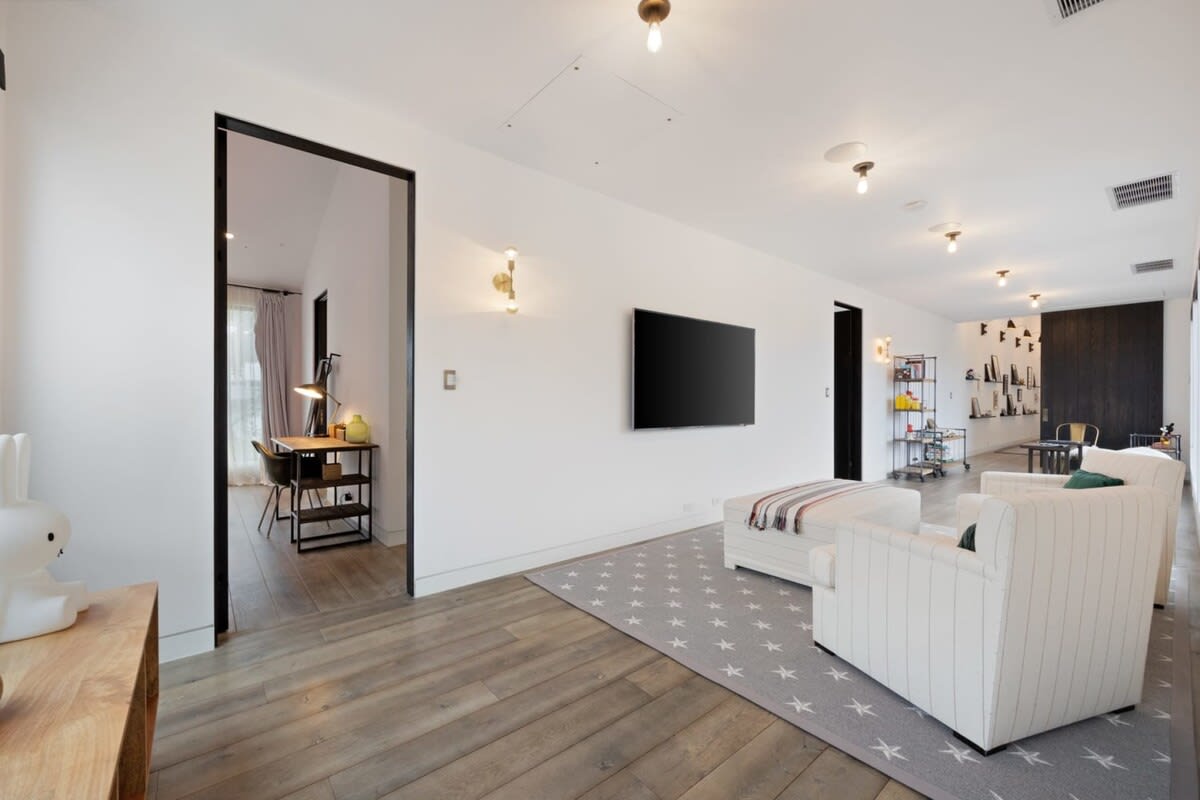 Snuggle up in this cosy corner to watch your favorite movie or just relax.