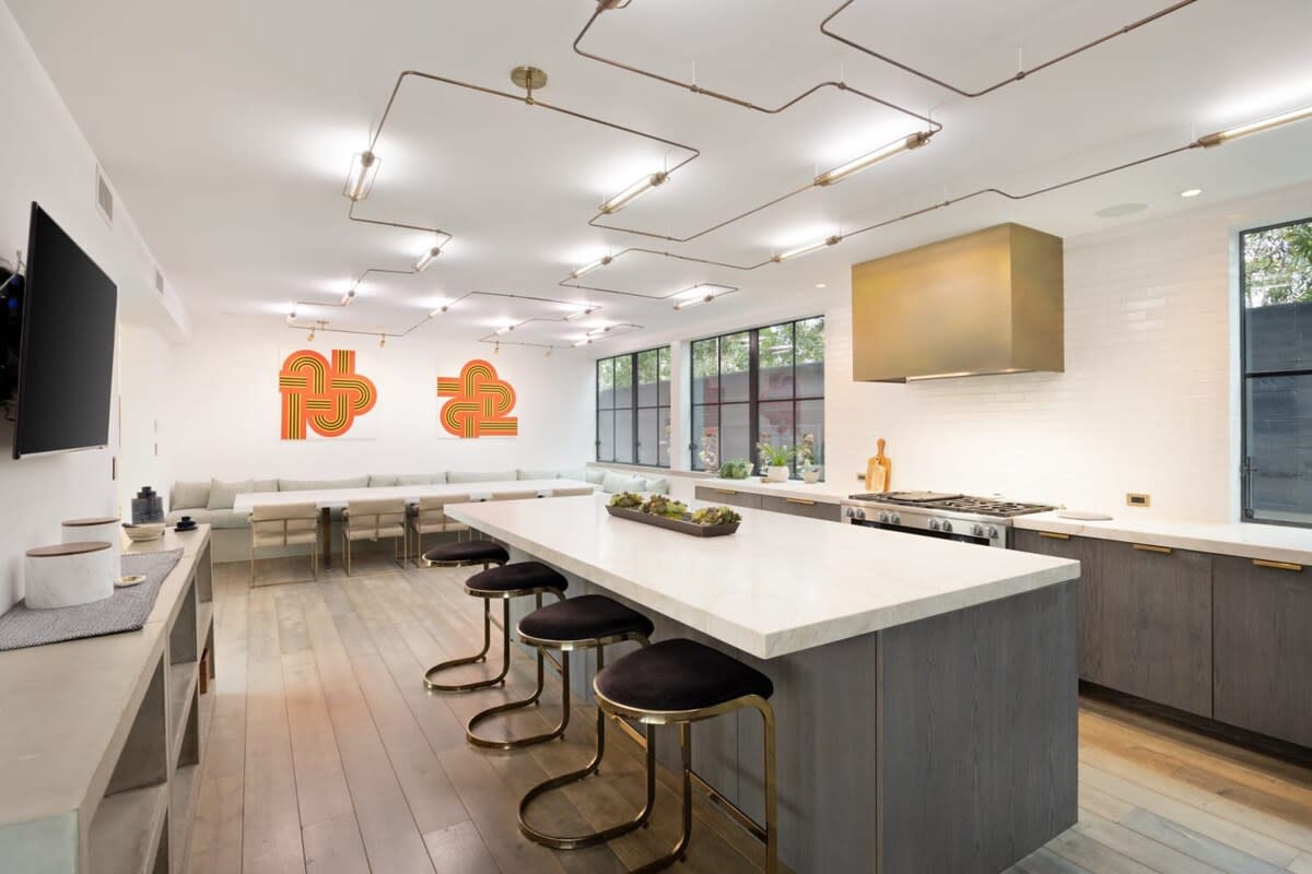Take a seat on one of the stylish bar stools in the open kitchen.