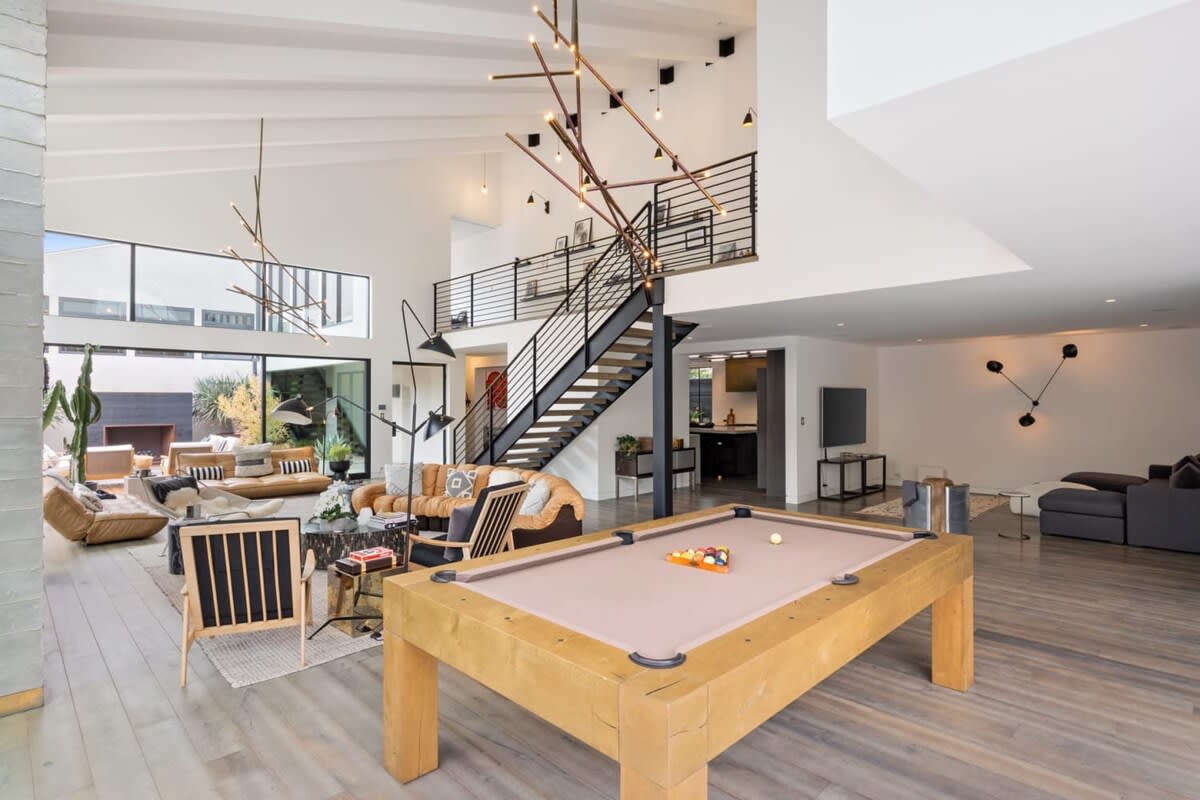 The pool table is situated to allow a fresh breeze to flow as you play.