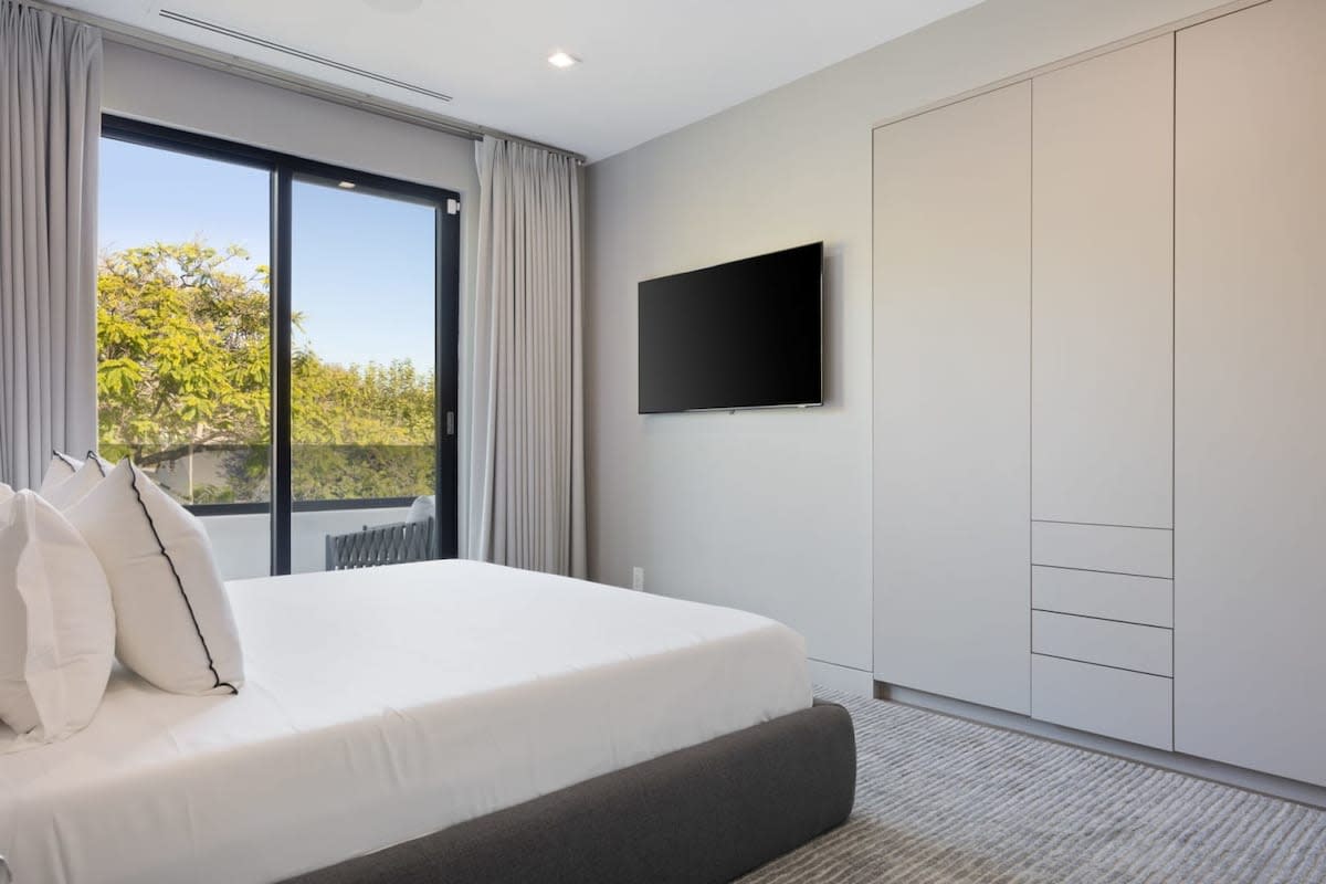 Ample closet space and relaxing view from balcony