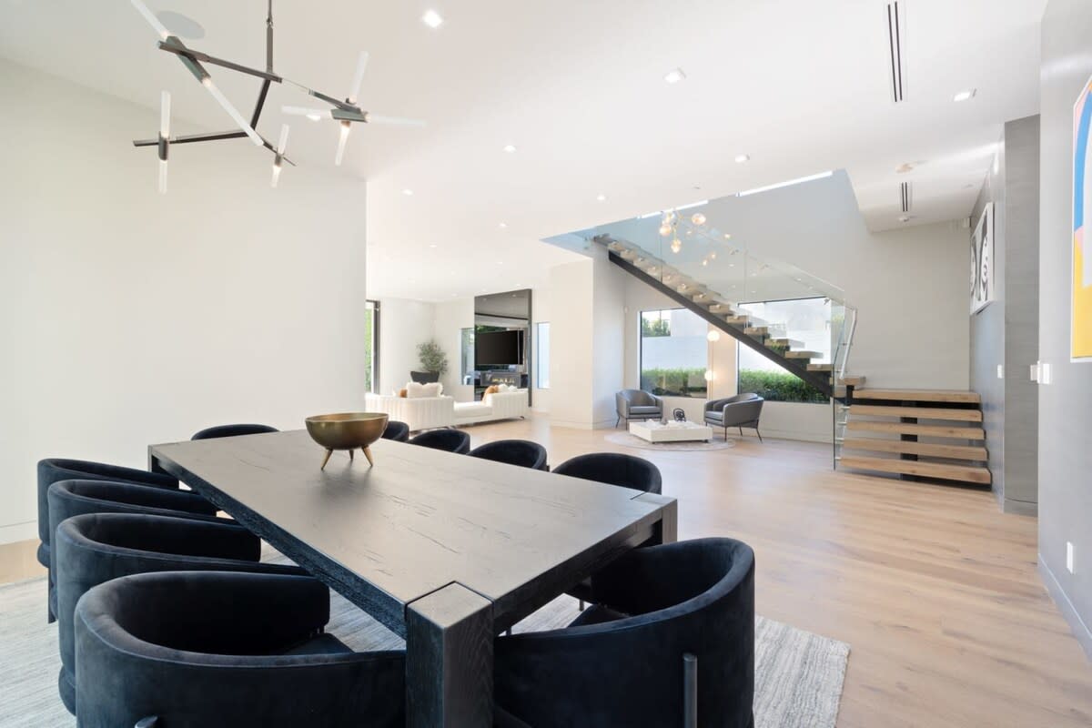 Enjoy a delicious meal at the 10-person dining table