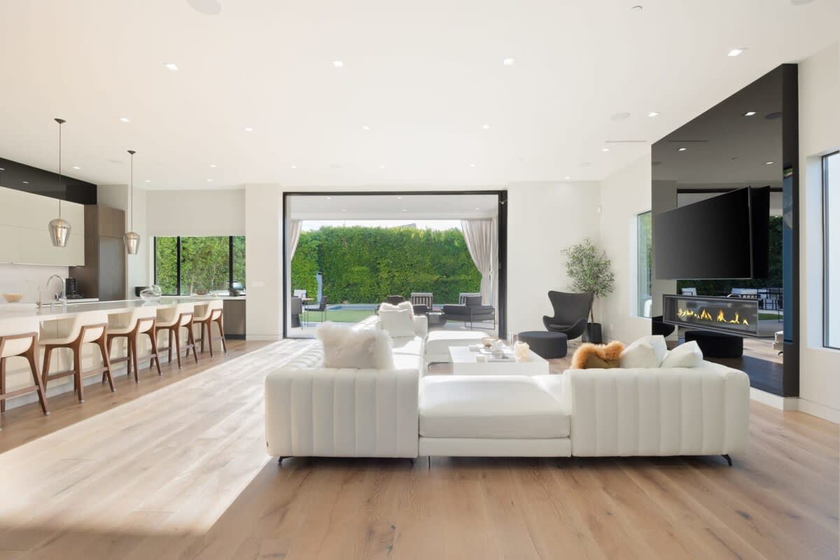 Move seamlessly to the private outdoor lounge area