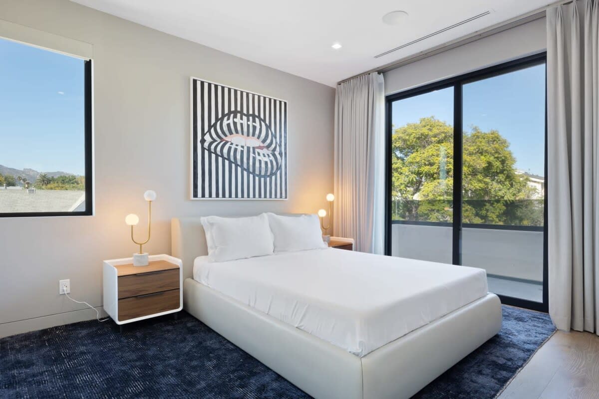 Take in the serene views of the Hollywood Hills from the bedroom