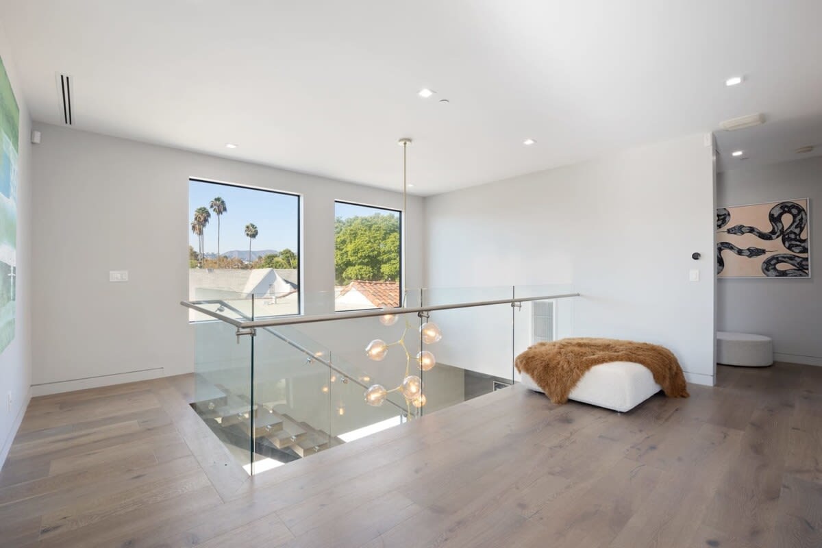 Towering ceilings add depth and scale