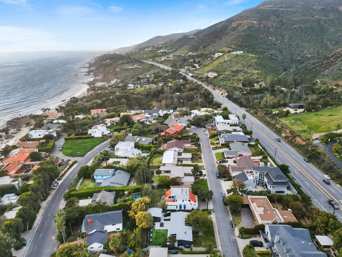 Nestled on a quiet street in a beachfront community just off of PCH