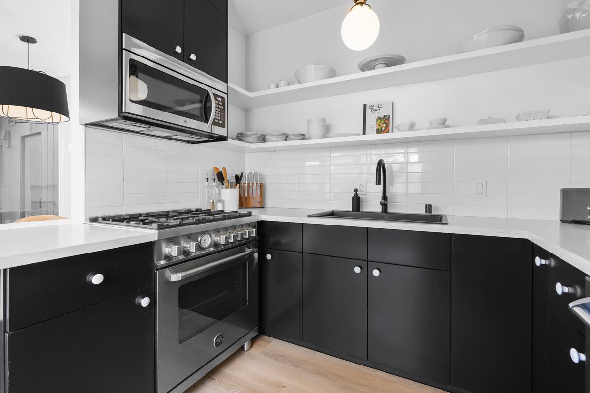 European style kitchen awaits you. Fully stocked kitchen with all high-end appliances, dinnerware, flatware, drinkware, 2 coffee systems, and chef preferred gadgets for baking and cocktail making.