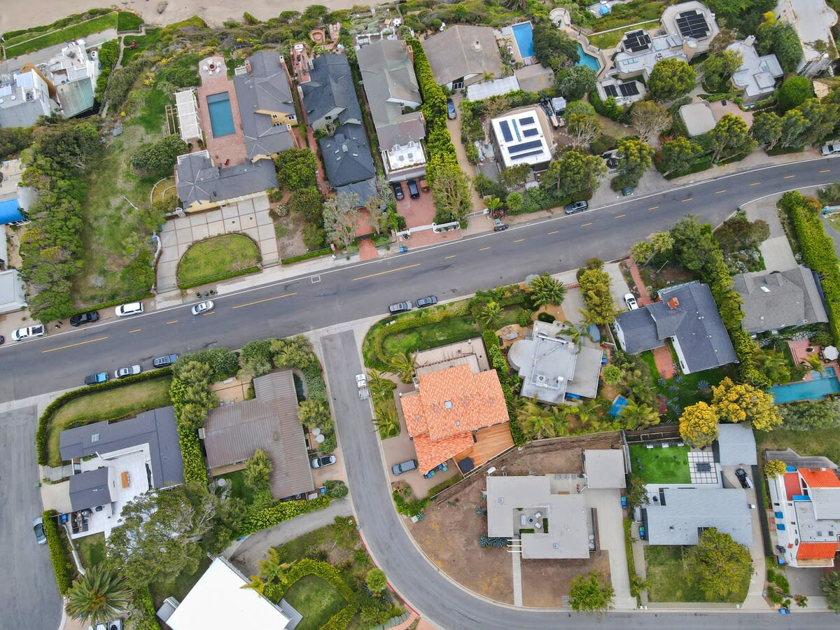 Nestled on a quiet street in a beachfront community just off of PCH