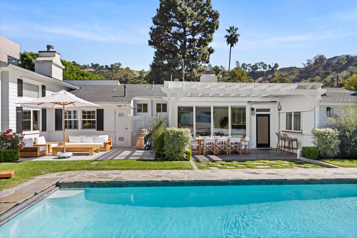 Embrace the harmonious blend of indoor and outdoor living in this inviting outdoor space.