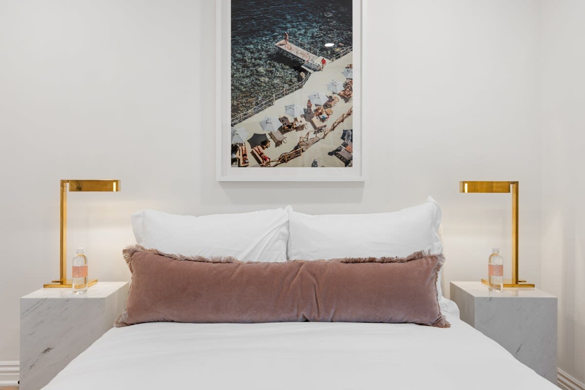 Experience redefined elegance in this bedroom, adorned with luxurious design touches.
