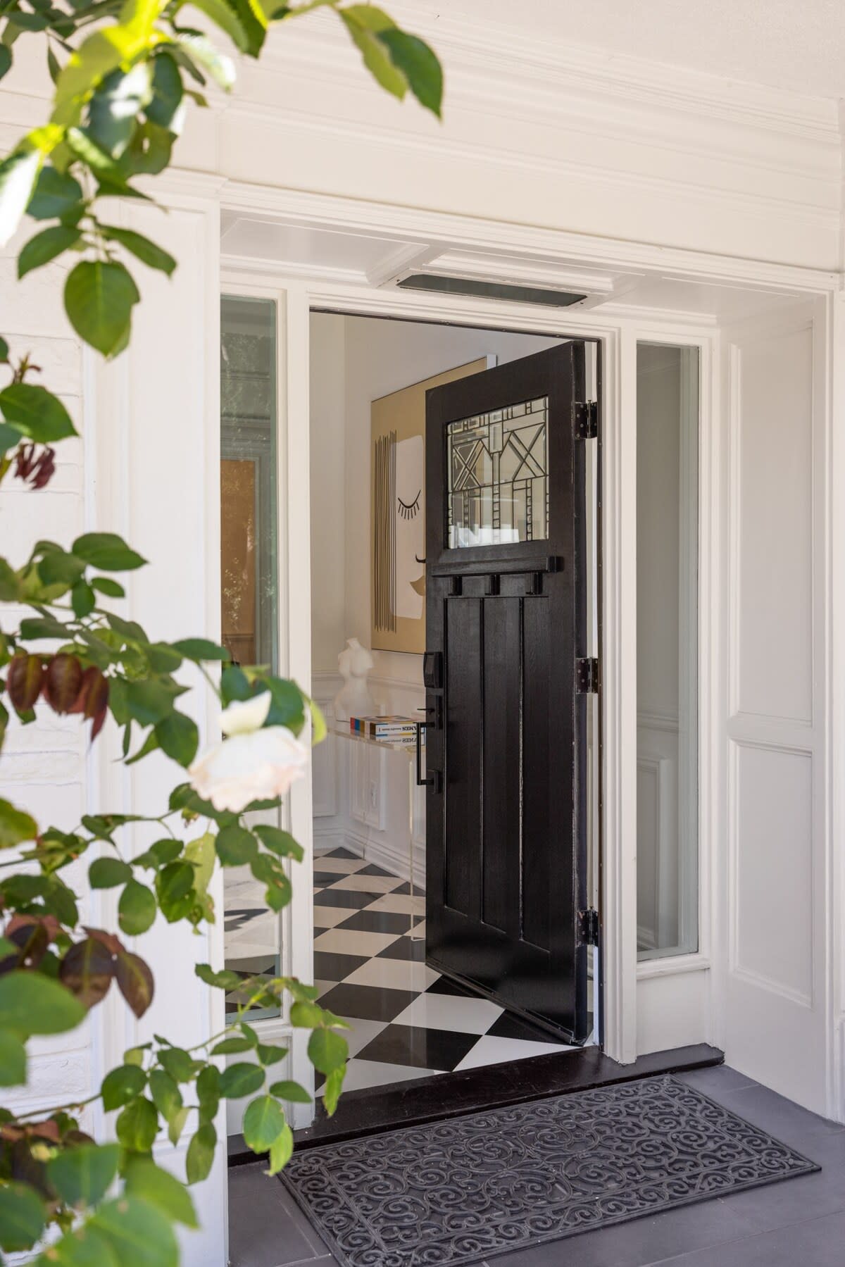 Step into style through the front door, where elegance meets a warm welcome in this Beverly Hills residence.