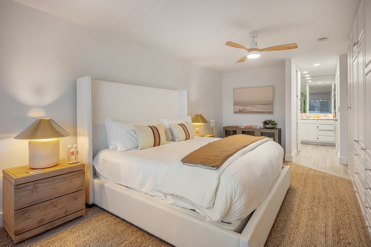 Experience serenity in the bedroom retreat, boasting ensuite luxury and opulent linens.