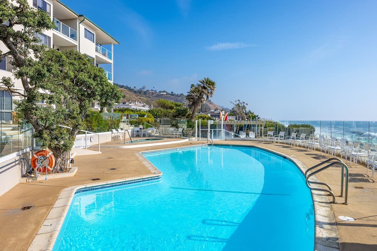 Dive into luxury with the large saltwater pool, heated year-round to a comfortable 78 degrees.