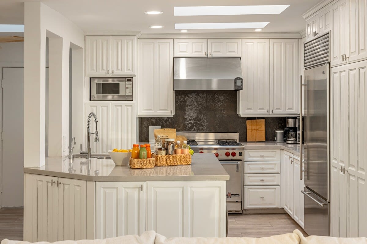 Sleek and stylish, the kitchen invites culinary moments in a modern setting.