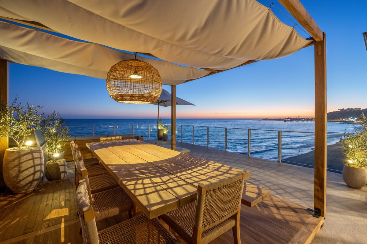 Soak in the serenity of the shore from the comfort of your coastal terrace.