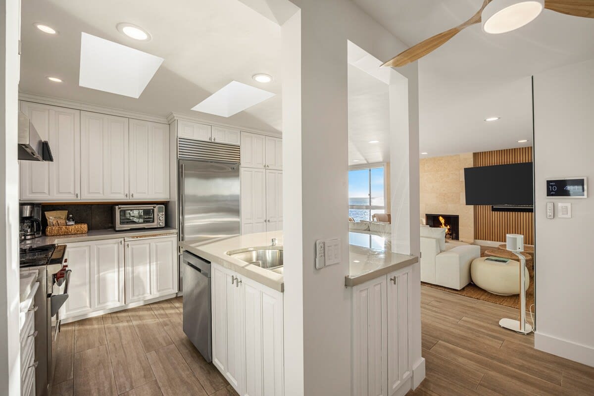 Cook in comfort with Sub-Zero refrigeration and espresso on demand.