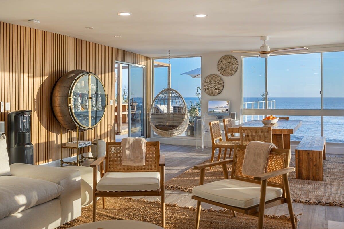 Timeless tranquility in the living room, where ocean views captivate at Aqualina.