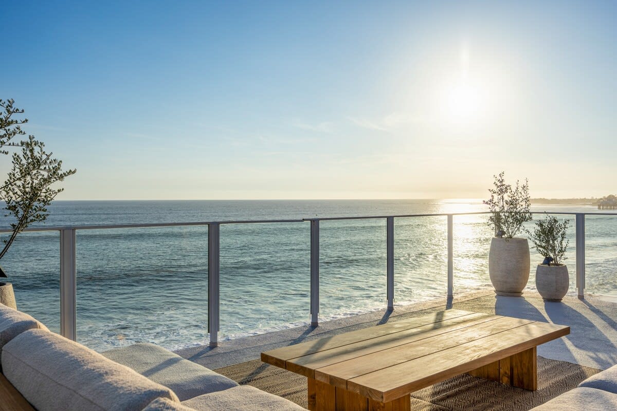 Unwind in the inviting outdoor lounge, a serene haven under the open sky