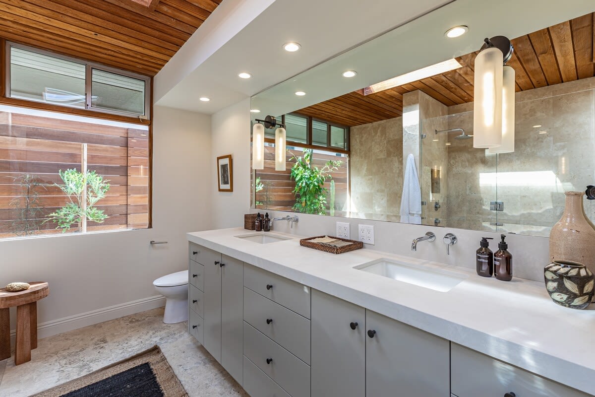 Experience contemporary elegance in the bathroom, featuring sleek design elements and thoughtful amenities for a refreshing escape.