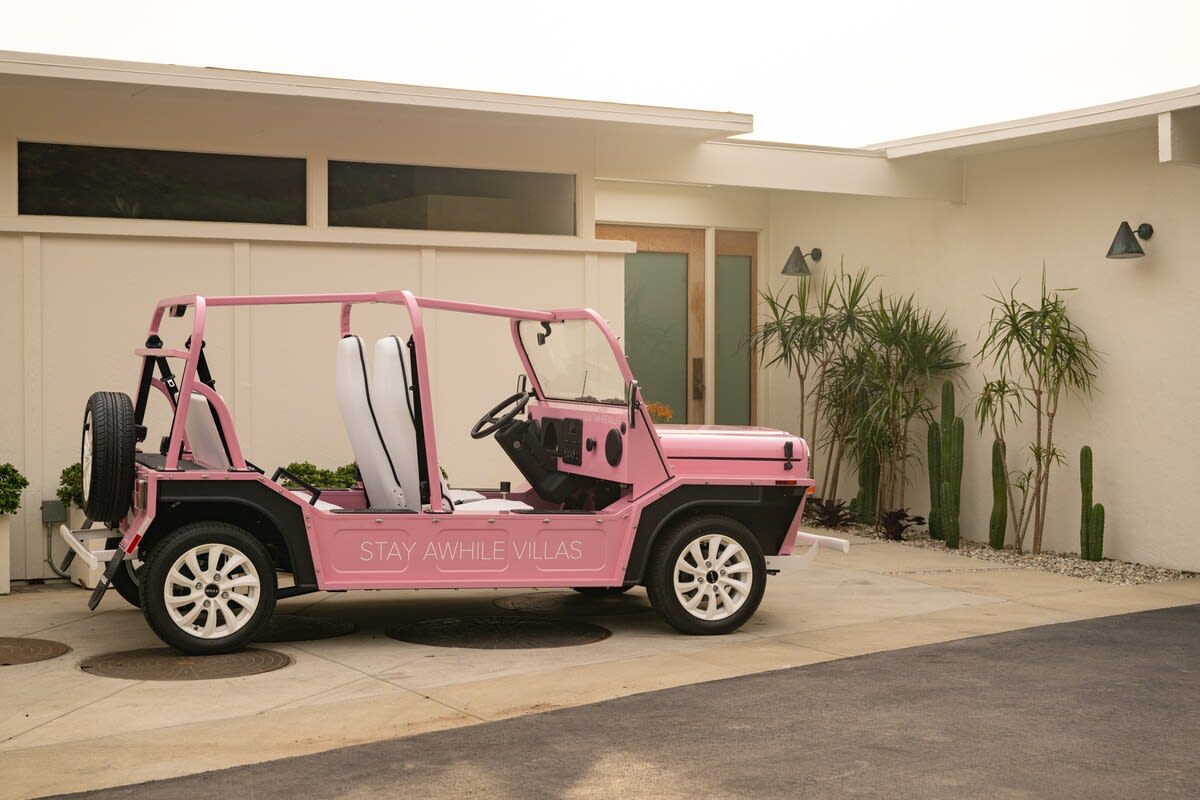 Capture carefree moments with the Beach Pink Moke, a whimsical ride for exploring the coastal beauty of Malibu.
