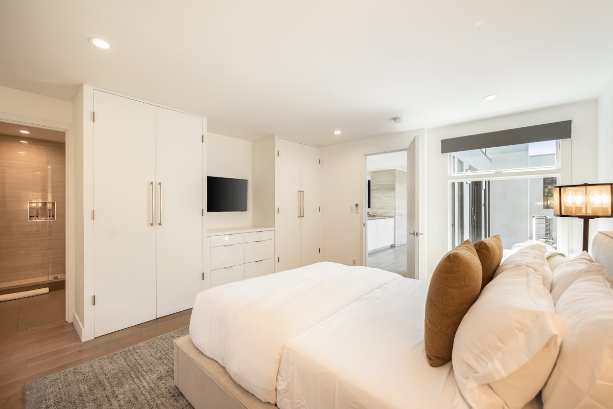 Experience the ultimate comfort with plush bedding, room-darkening shades, and plenty of extra pillows and blankets.