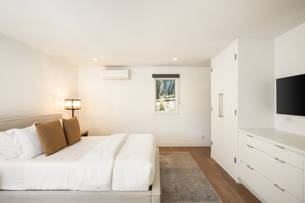 Experience the ultimate comfort with plush bedding, room-darkening shades, and plenty of extra pillows and blankets.
