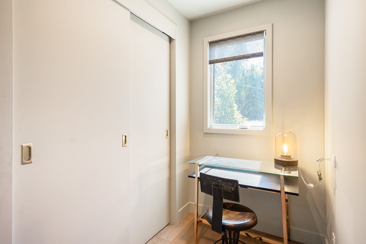 Dedicated workspace with a desk and privacy.