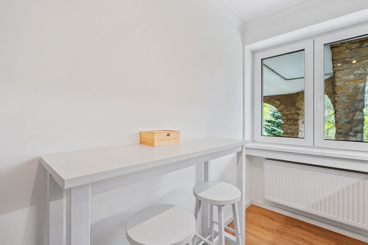 Bright and minimalist bar area, perfect for enjoying your morning coffee.