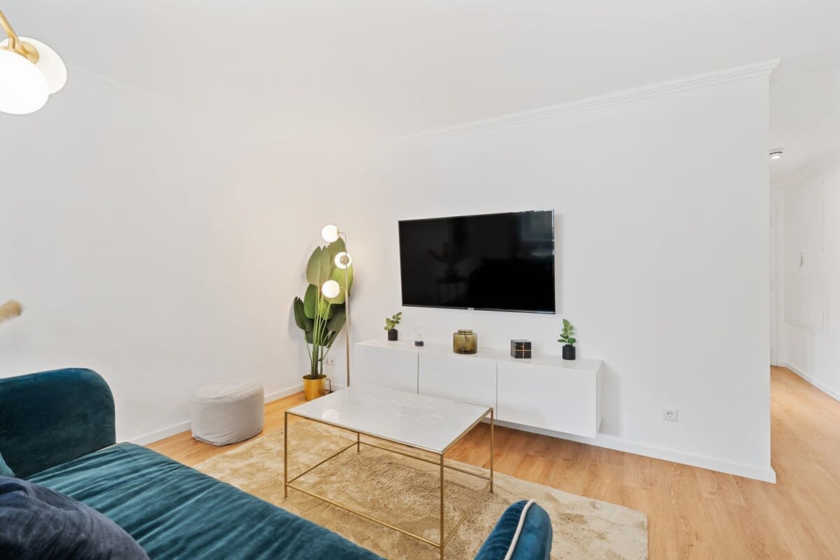 Modern living area with ample seating, perfect for relaxing after a day out.