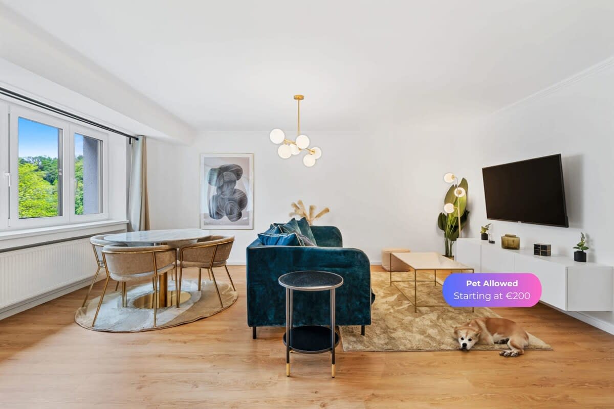 Spacious living area with stylish decor and pet-friendly options available.