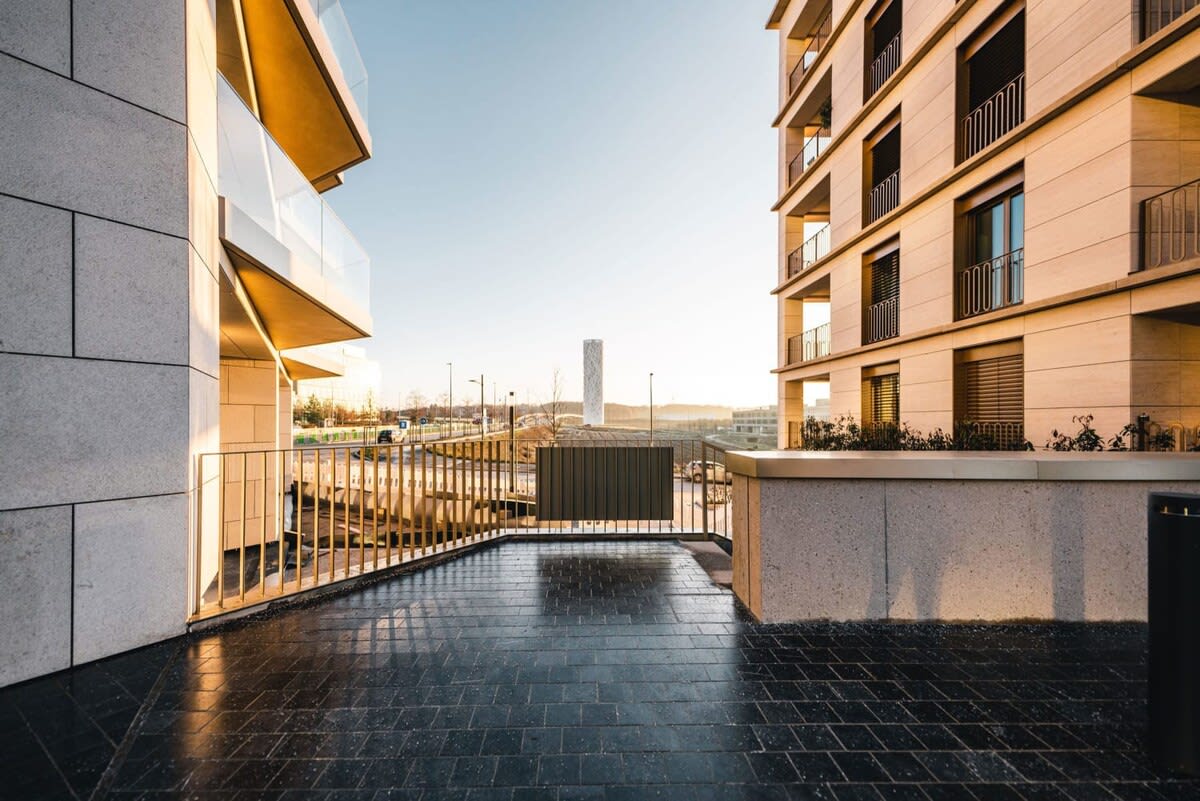 Modern architecture meets serene landscapes at your doorstep for an urban retreat.