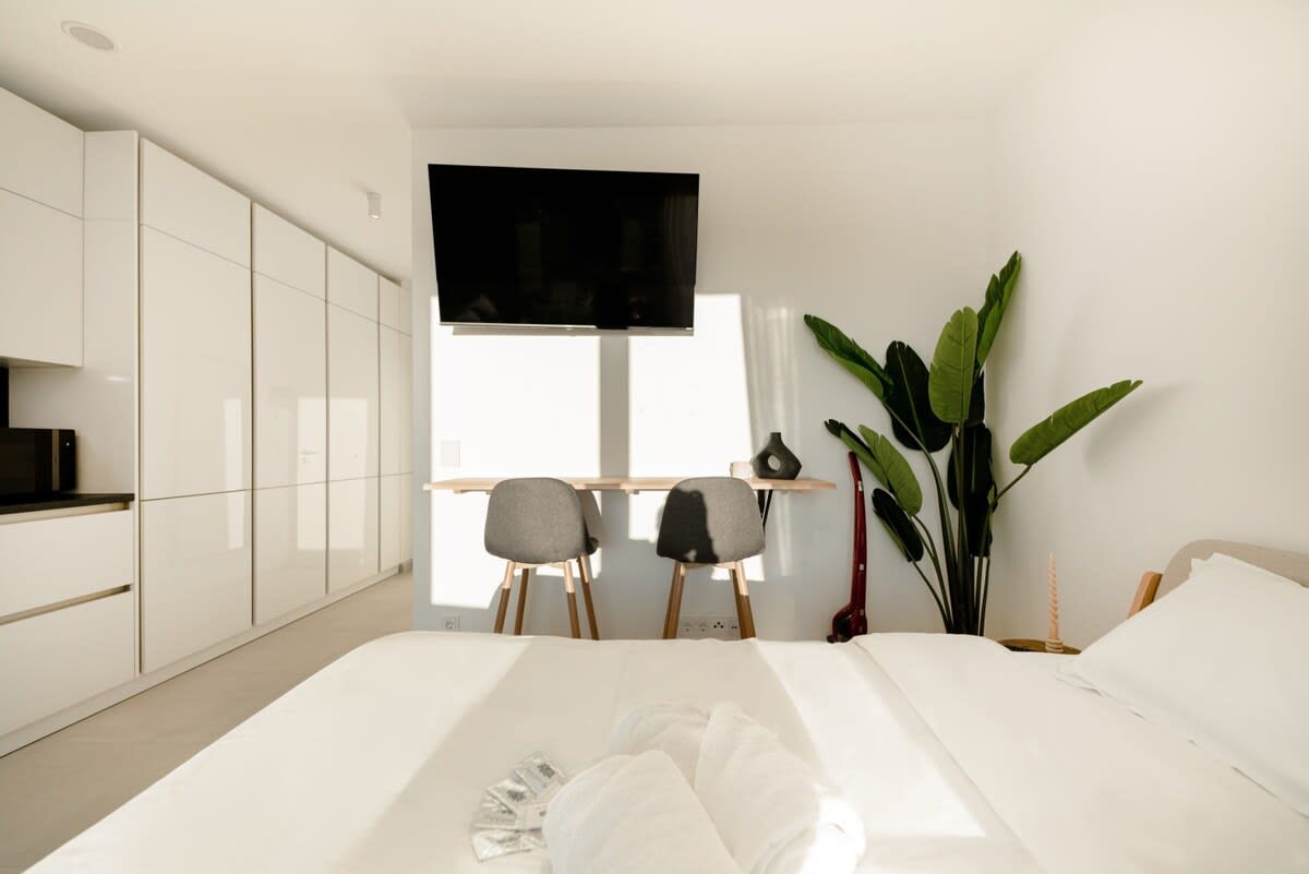 Wake up to a sunlit room with seamless design flowing from comfort to function effortlessly.