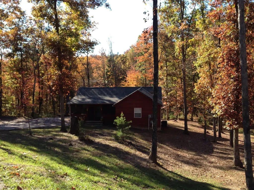 Gas fireplace, firepit, and cedar Adirondack chair — Spencer, TN — vacation rental