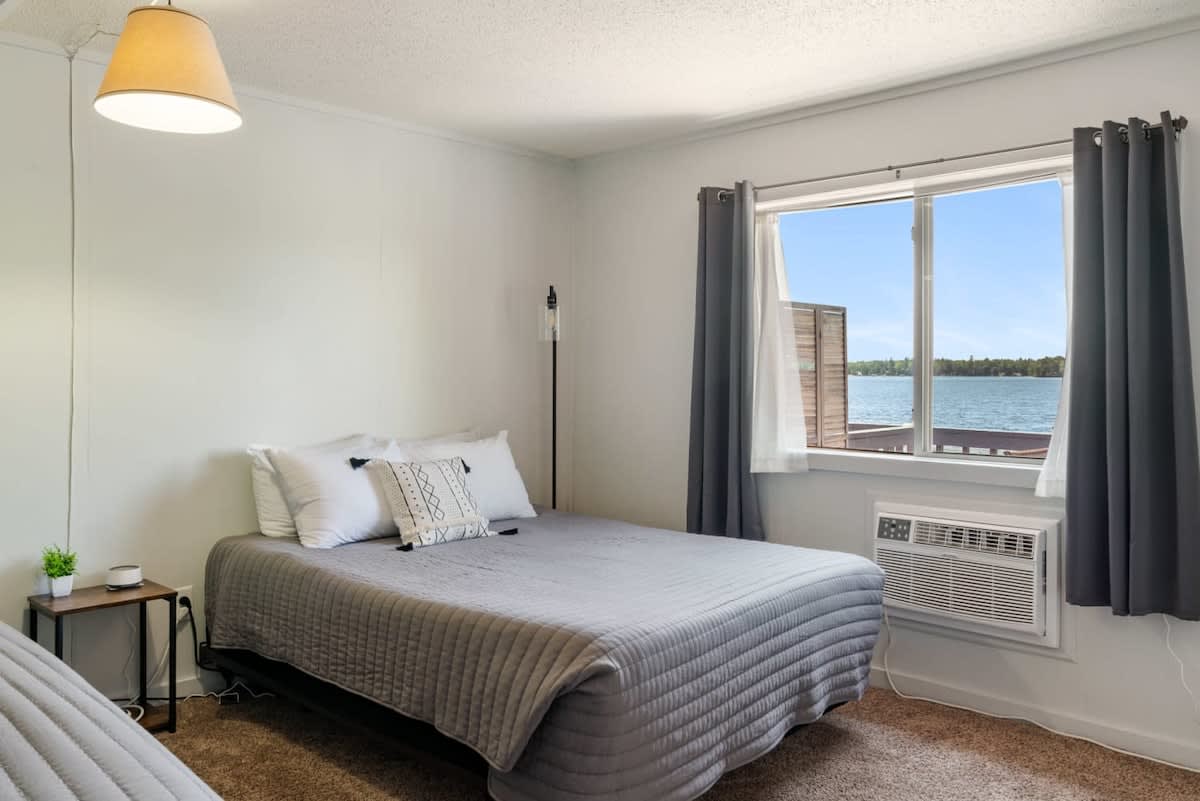 Rustic lakeside condo on Fife Lake with fully equipped kitchen and balcony — Fife Lake, MI — vacation rental