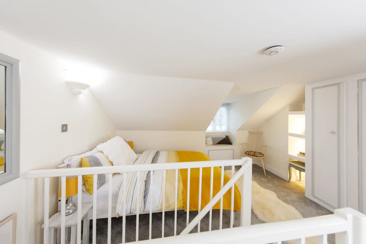 Venture to the top floor to find a spacious double room with plenty of storage space.