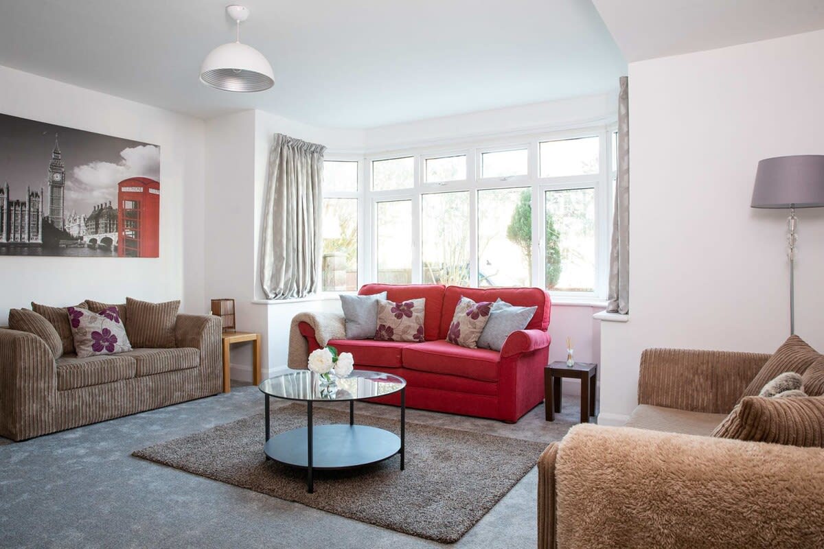 There are 2 sofas in the living room. One converts into a bed for extra sleeping space.