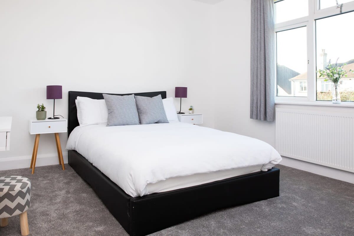 Another angle on the double bed in this bright and welcoming bedroom.