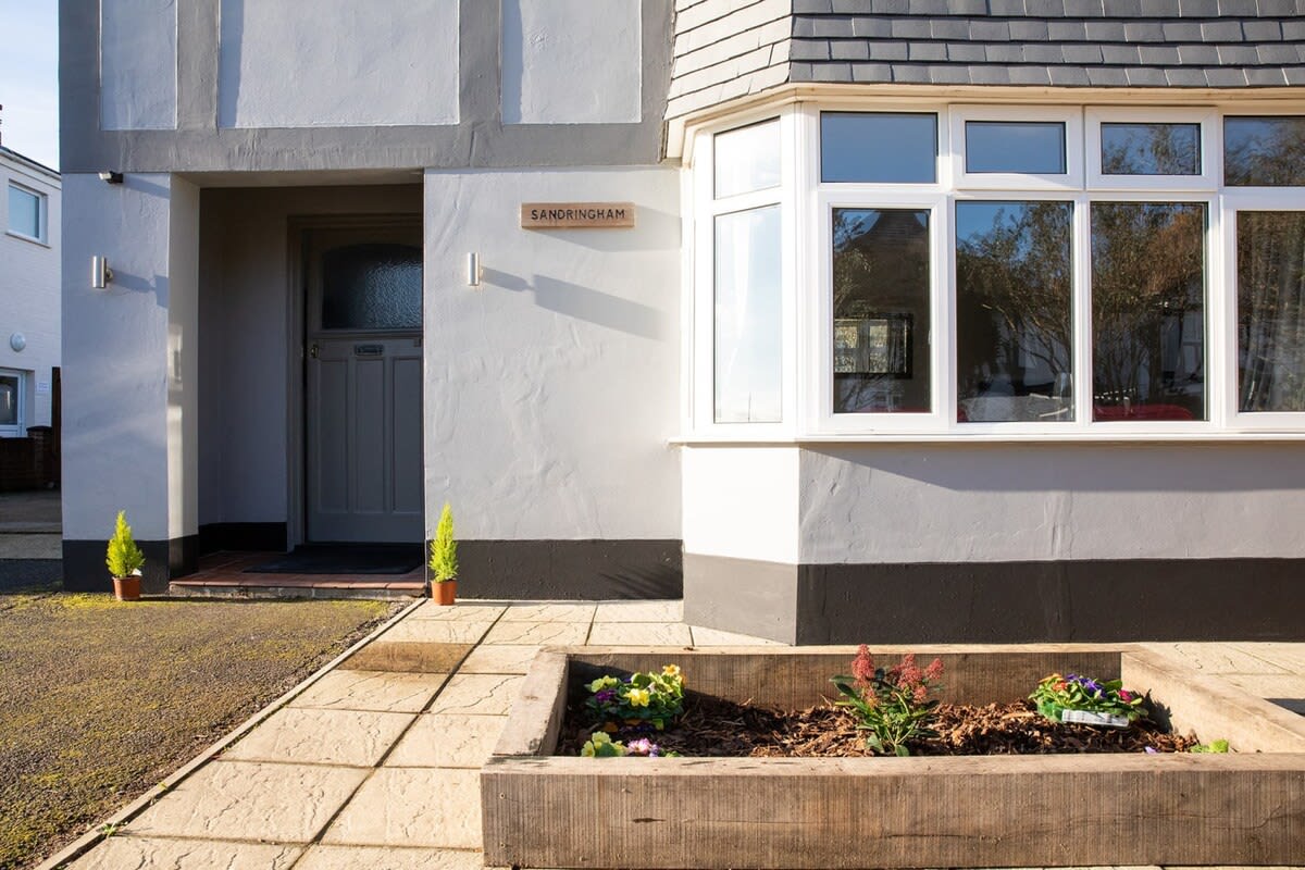 A shot of your private front door and a hint of the style and luxury to come.