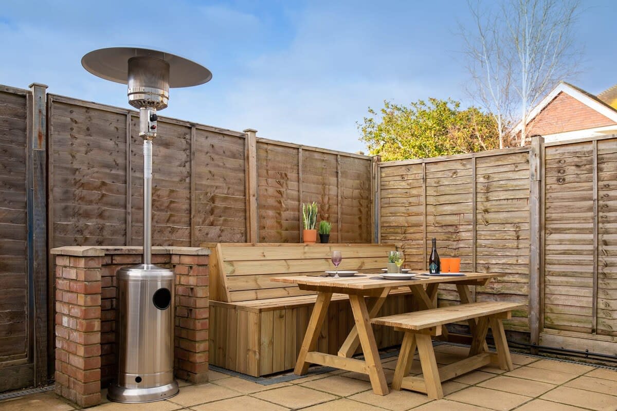 Eat al fresco in the home's landscaped garden.