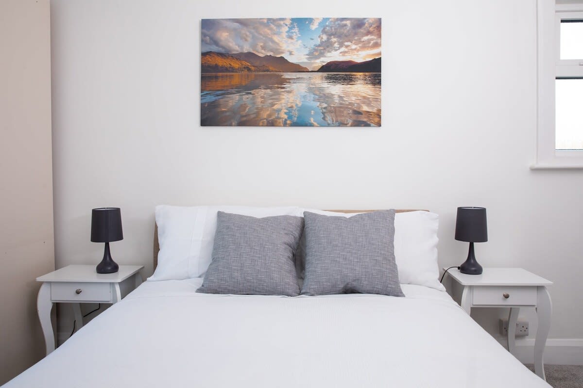 Another double bed. Another uplifting print on the wall.