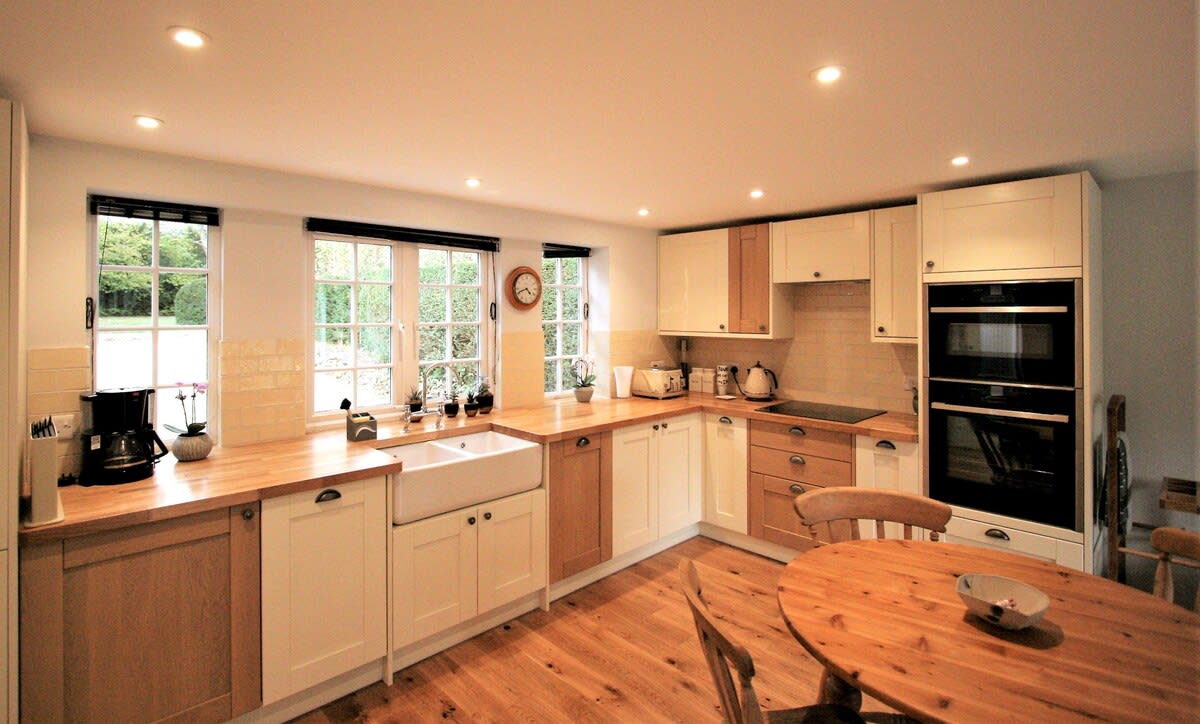 Loads of workspace for preparing dinner and a double oven to prepare it with!