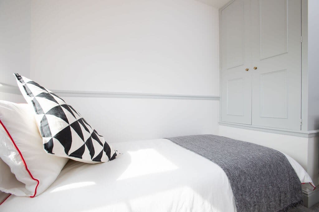 The single room offers another comfy bed.