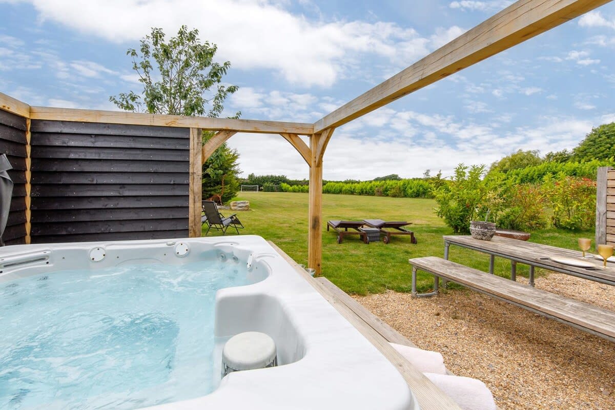 The hot tub is open and heated all year round.