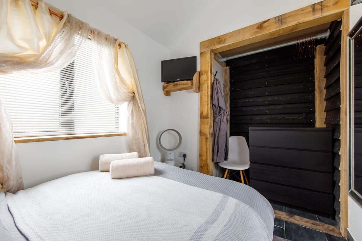 Relax in bed with a spot of TV before drifting off into a deep sleep.