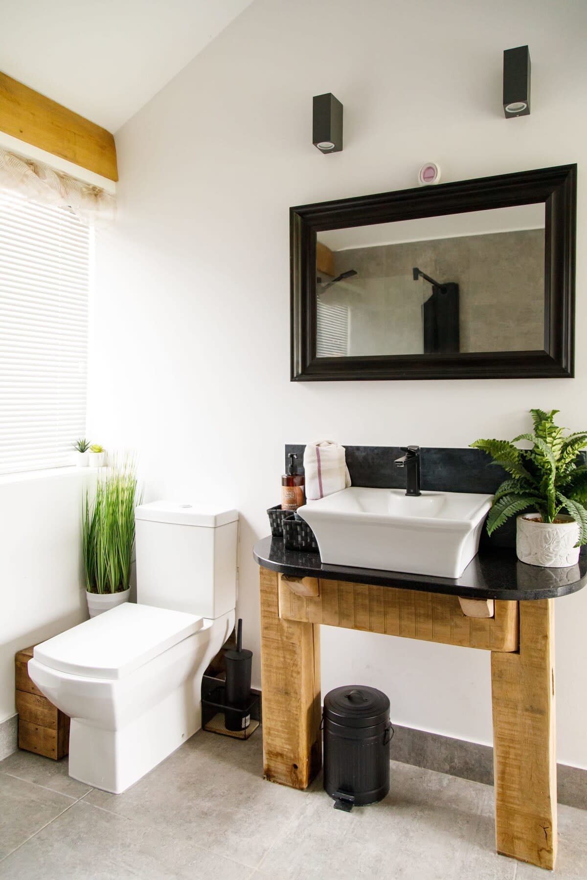 The ensuite from the master bedroom has a large shower, sink and WC.