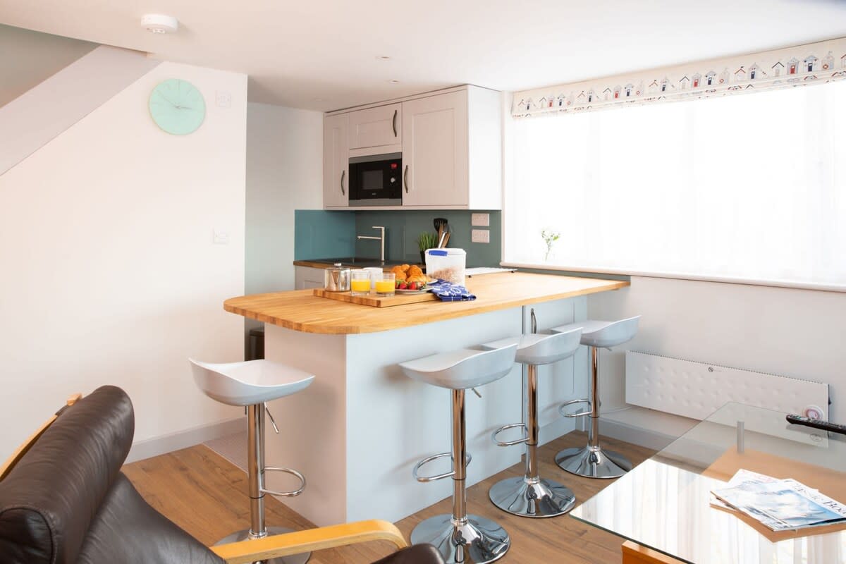 Perch at the breakfast bar for your morning coffee or evening drink.