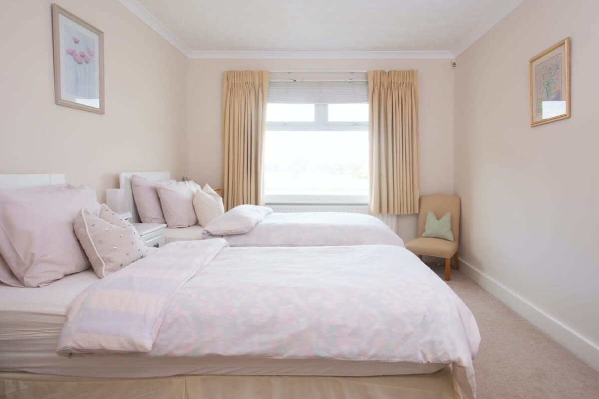 Ground floor twin bedroom with shower en-suite.