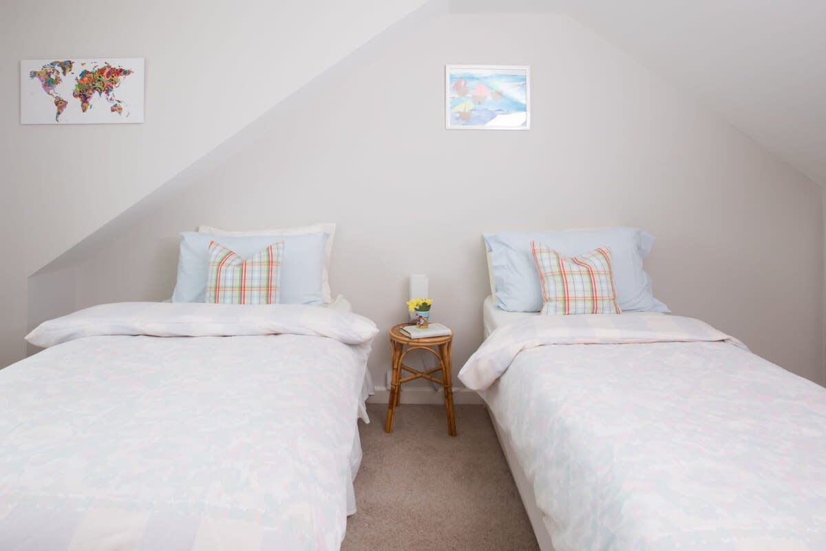 One of the detached home’s twin bedrooms.